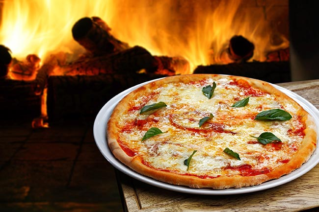 Using firewood in your pizza oven